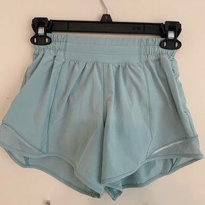 Lulu lemon teal colored tall athletic shorts